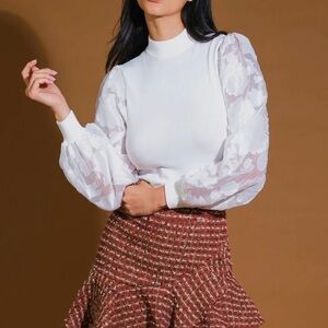 15. Knit sweater top with sleeve detail in white